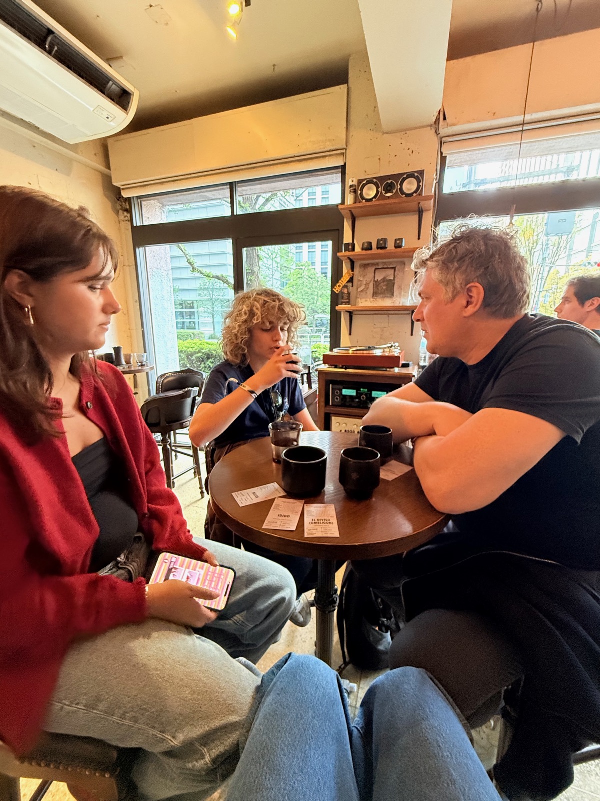 Seraphima, Luca, and Max enjoying pour-overs at Glitch Coffee