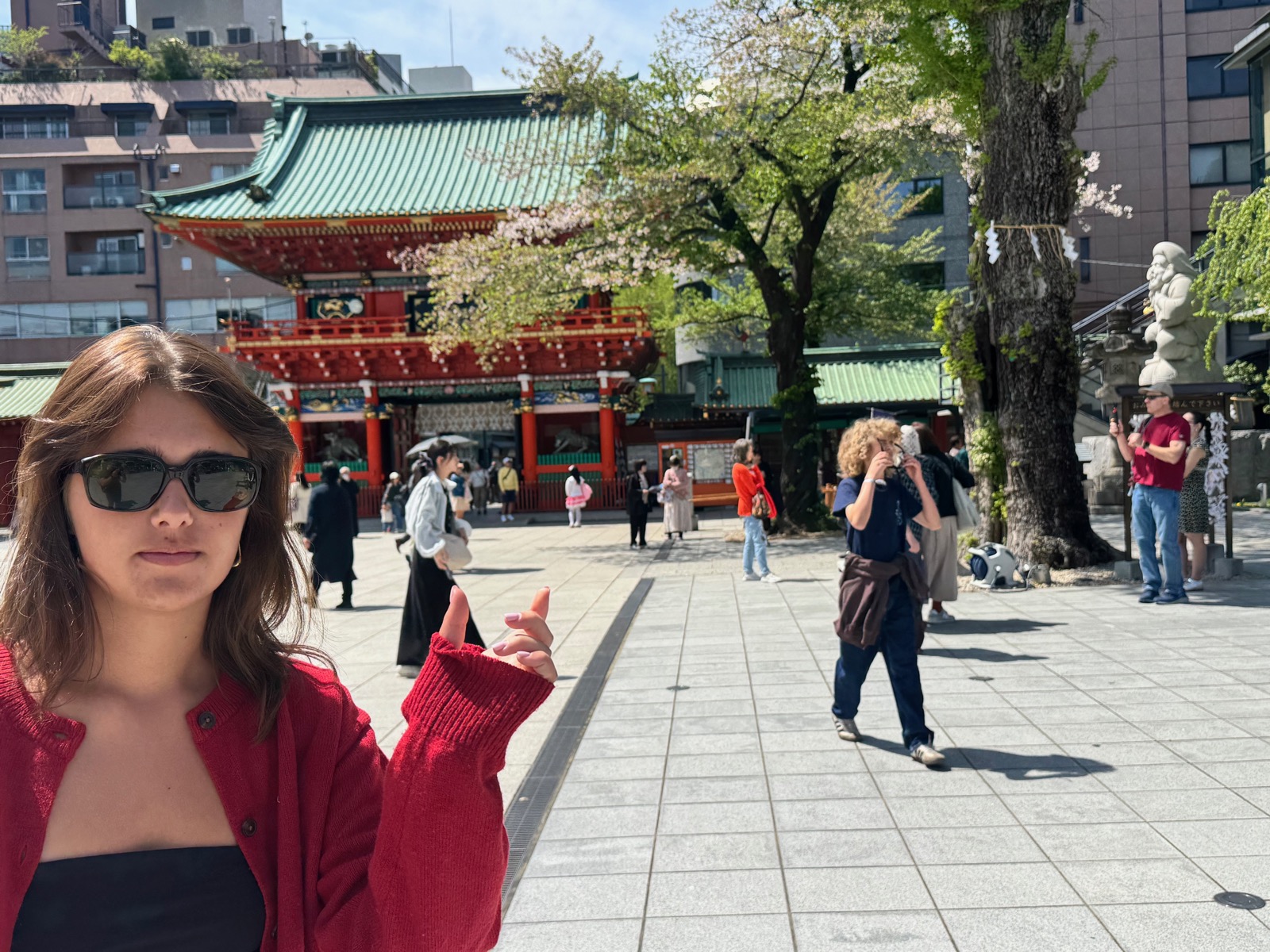 Seraphima selfie at Kanda Myojin gate with cherry blossoms