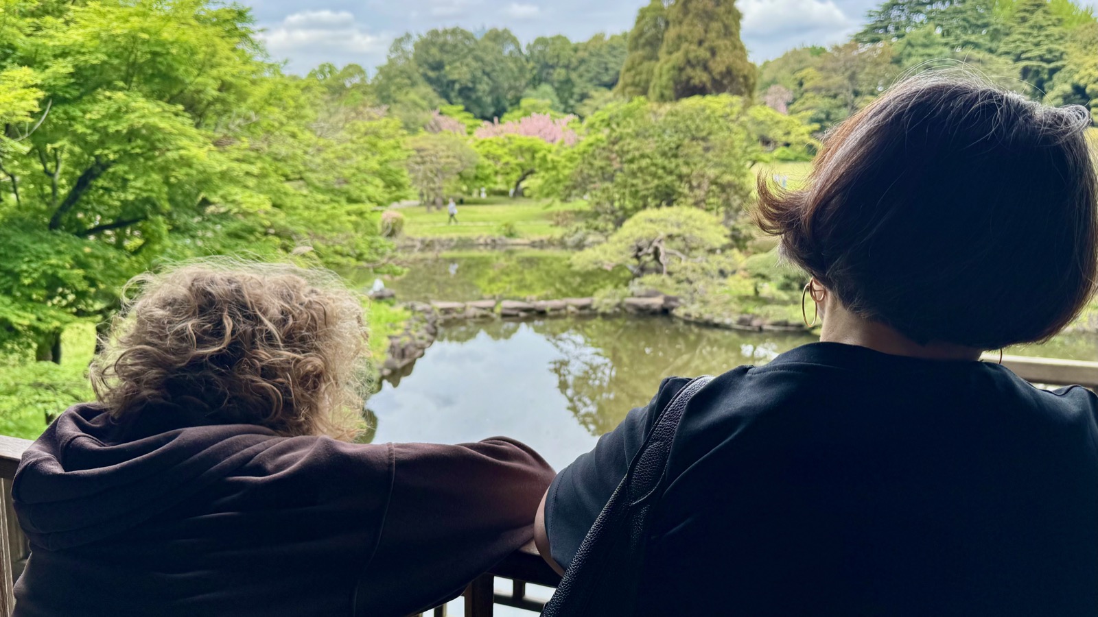 Luca and Natalia overlooking the Japanese traditional garden pond