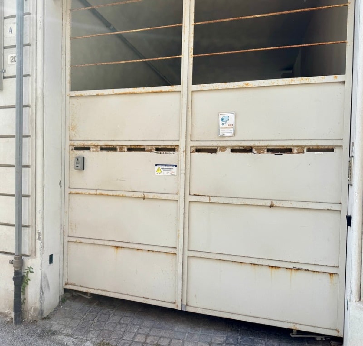 The external gate to the parking and apartment