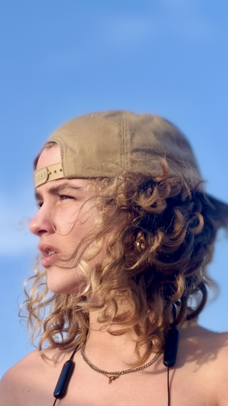 Luca against the blue sky, cap on backwards