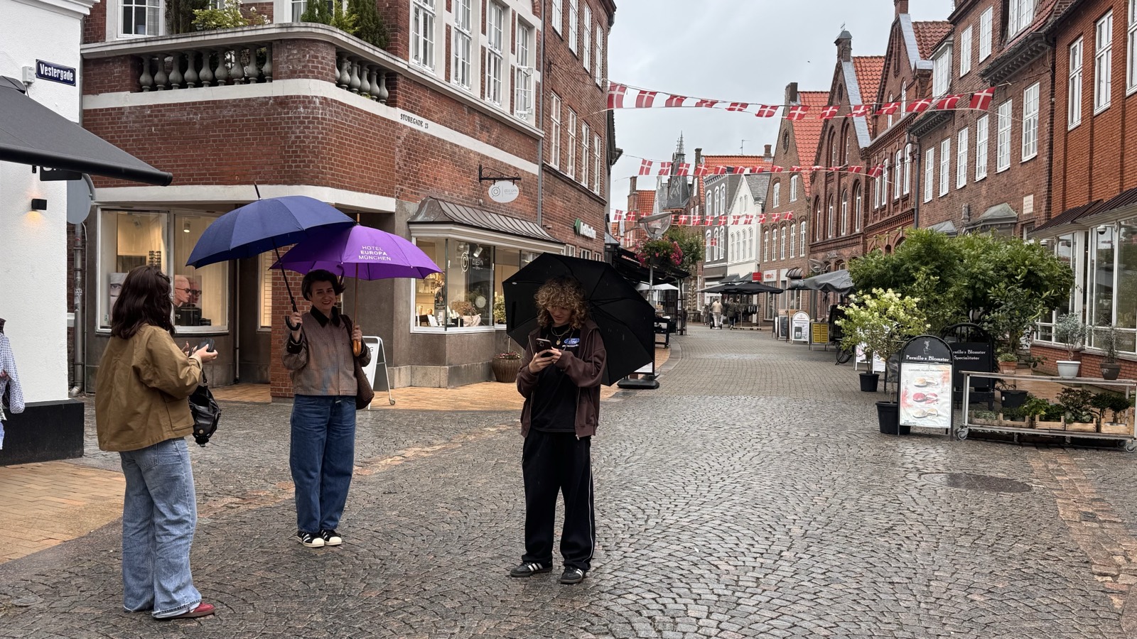 Umbrellas out on the cobbles of Tønder Midtby
